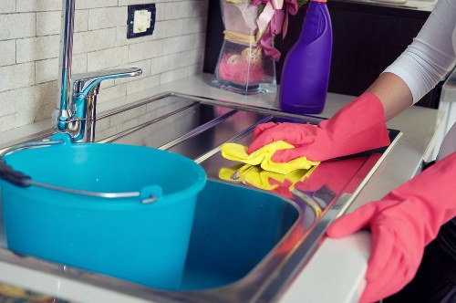 Dusting high surfaces during after builders cleaning